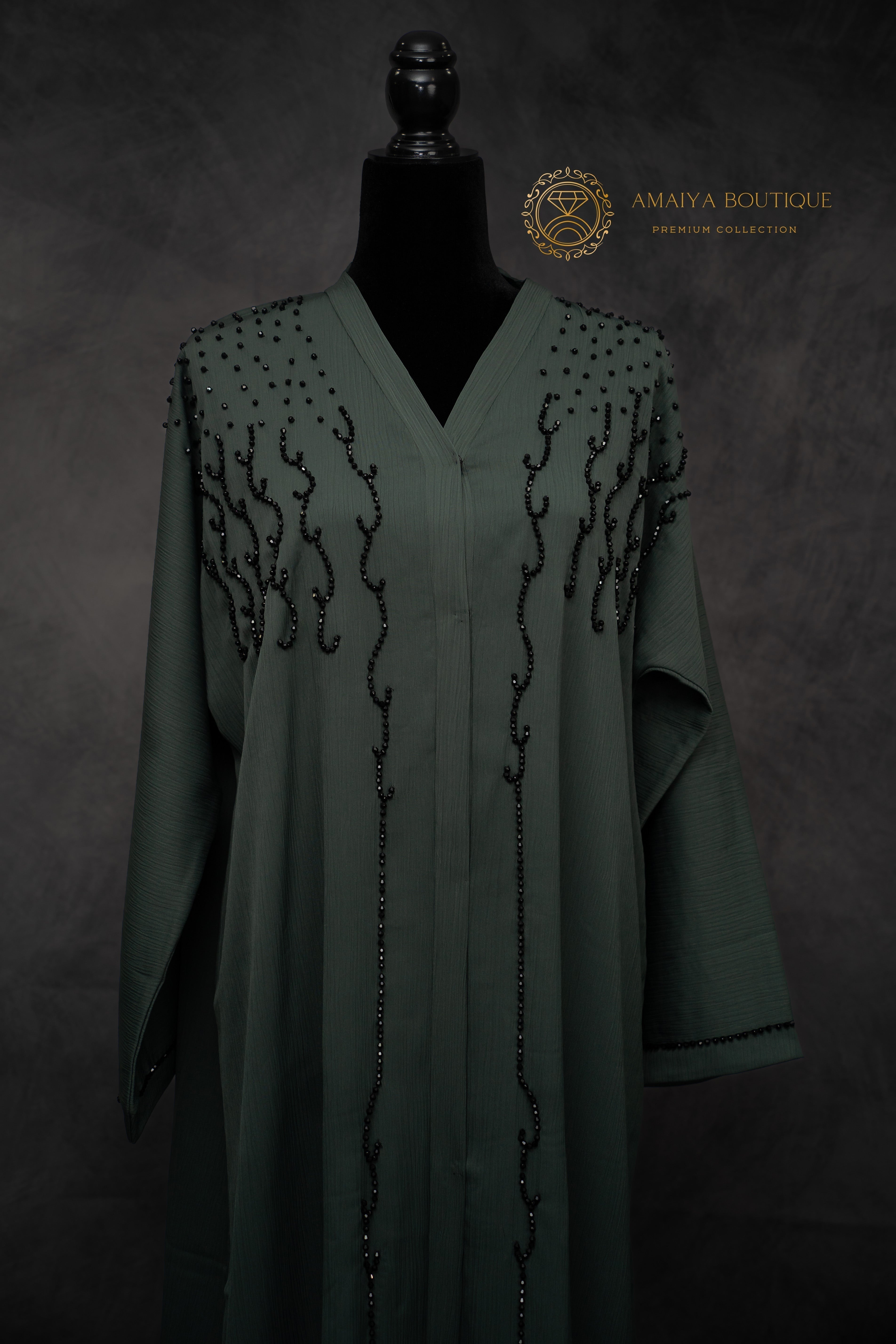 elegant dark green abaya – modest fashion