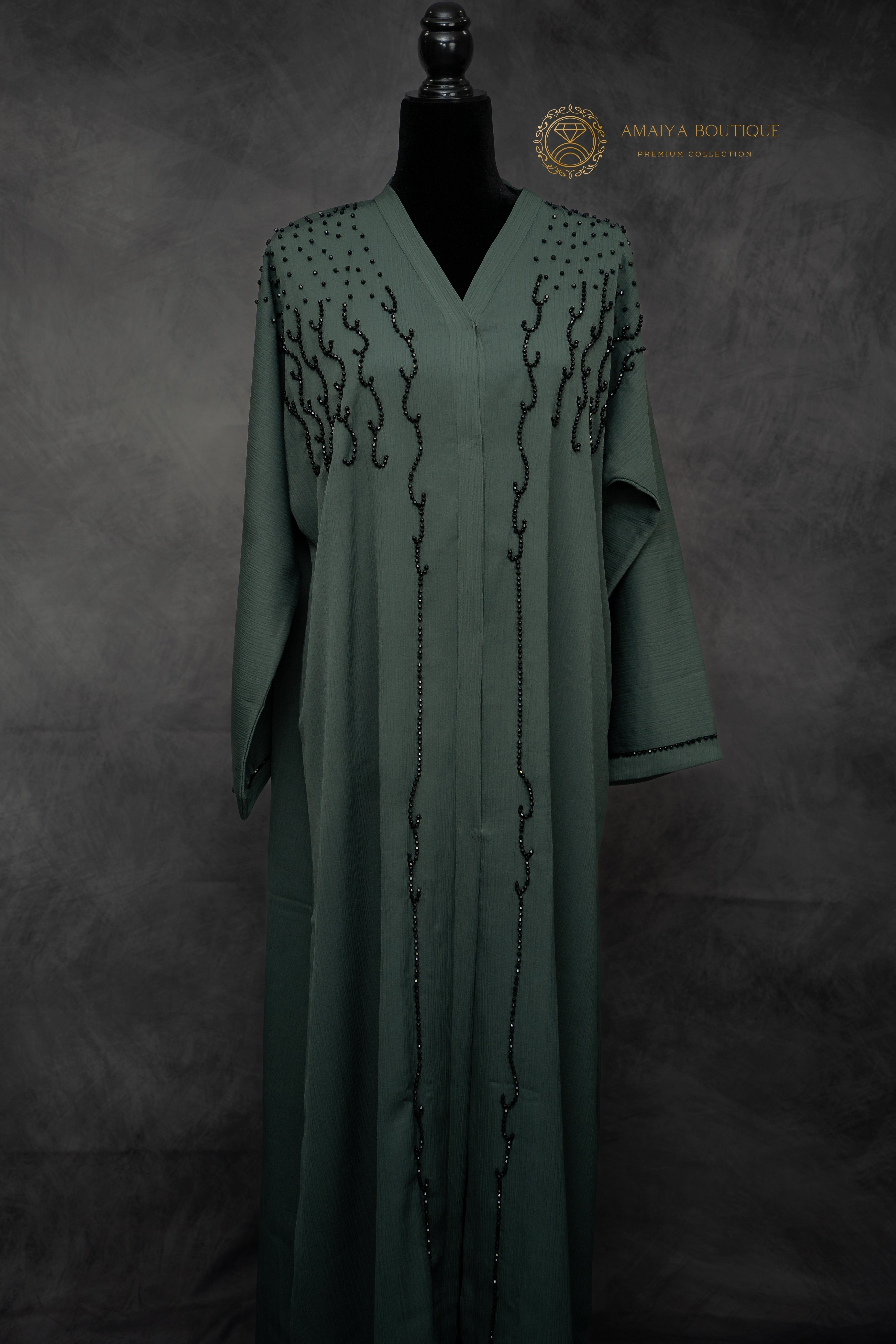 elegant dark green abaya – modest fashion