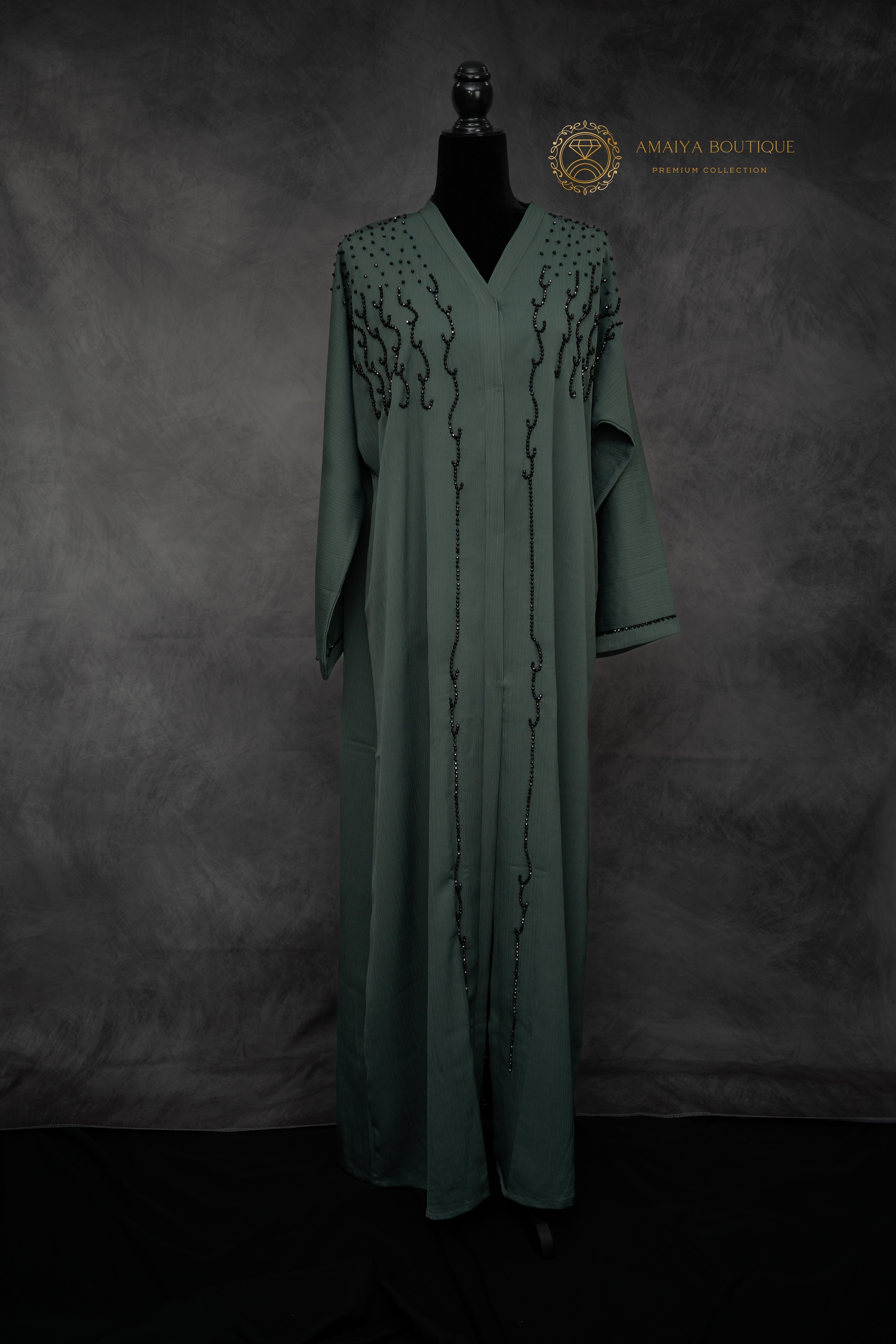 elegant dark green abaya – modest fashion